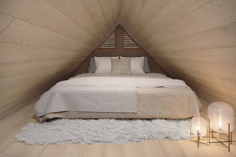 interior of a-frame hemp cabin with bed